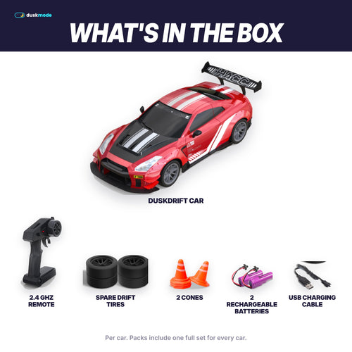 What's in the box: car, 2.4 GHz remote, spare drift tires, cones, batteries, USB cable